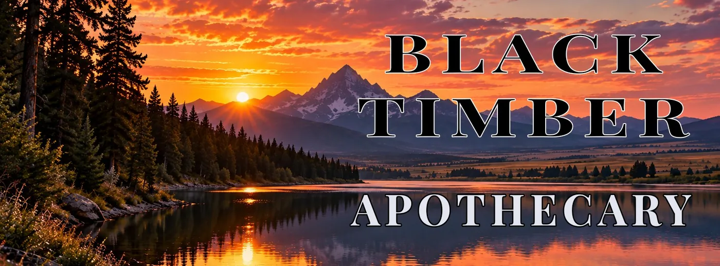 Sunset over a mountain lake, Black Timber Apothecary set against the sky and water